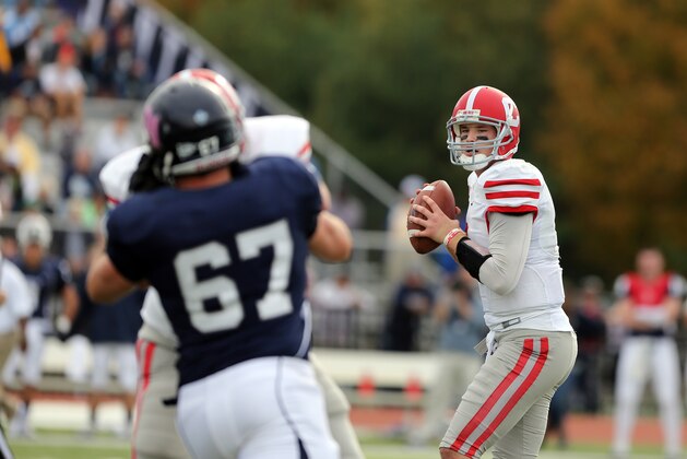 Cornell Big Red QB Jeff Mathews #9 in action against the Monmouth Hawks in their NCAA college football game in West Long Branch, NJ, Saturday, Oct. 19, 2013. Monmouth won 48-23. (AP Photo/Gregory Payan)