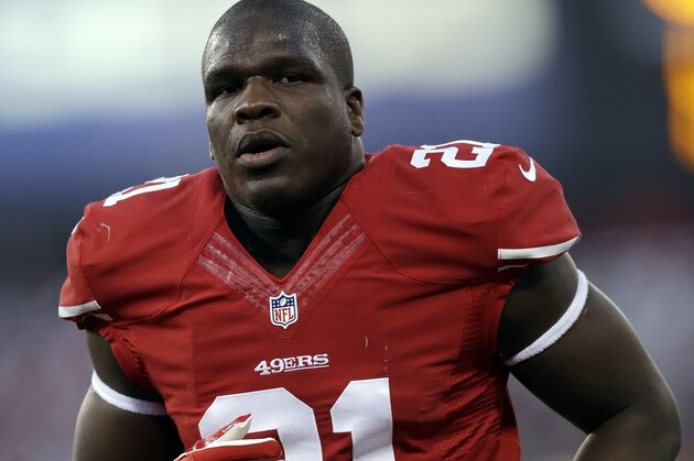 San Francisco 49ers running back Frank Gore warms up before an NFL football game between the San Francisco 49ers and the Atlanta Falcons in San Francisco, Monday, Dec. 23, 2013. (AP Photo/Marcio Jose Sanchez)