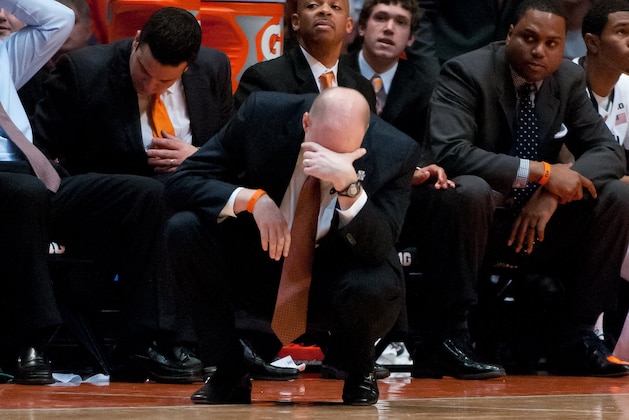 Illinois Fighting Illini head coach John Groce reacts to a foul call during the second half of an NCAA college basketball game in Champaign, Ill., on Tuesday, Dec.31, 2013. (AP PHOTO/Bradley Leeb)