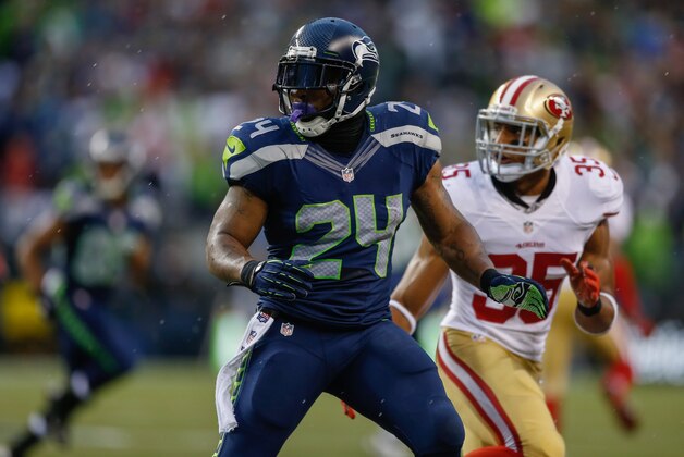 SEATTLE, WA - SEPTEMBER 15:  Running back Marshawn Lynch #24 of the Seattle Seahawks runs a pass route against the San Francisco 49ers at CenturyLink Field on September 15, 2013 in Seattle, Washington.  (Photo by Otto Greule Jr/Getty Images)