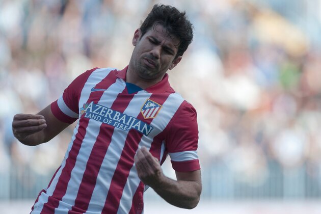 Atletico de Madrid's Diego Costa from Brazil gestures during a Spanish La Liga soccer match between Malaga and Atletico de Madrid at the La Rosaleda stadium in Malaga, Spain, Saturday, Jan. 4, 2014. (AP Photo/Daniel Tejedor)