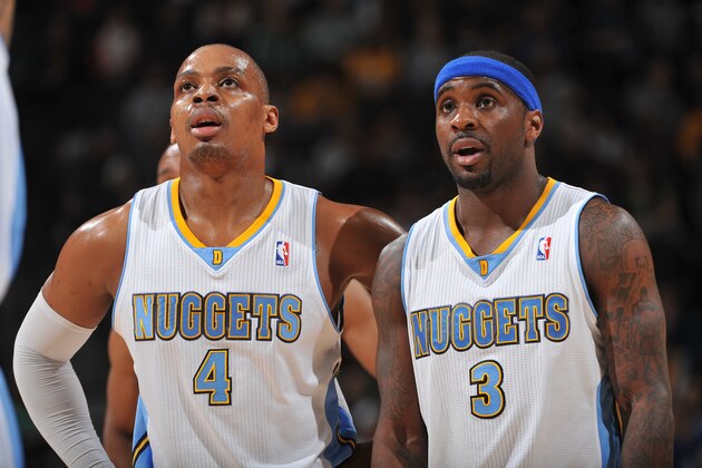 DENVER, CO - JANUARY 7: Randy Foye #4 and Ty Lawson #3 of the Denver Nuggets looking on during a game against the Boston CelticsThe Boston Celtics versus the Denver Nuggets on January 7, 2014 at the Pepsi Center in Denver, Colorado. NOTE TO USER: User expressly acknowledges and agrees that, by downloading and/or using this Photograph, user is consenting to the terms and conditions of the Getty Images License Agreement. Mandatory Copyright Notice: Copyright 2014 NBAE (Photo by Garrett W. Ellwood/NBAE via Getty Images)