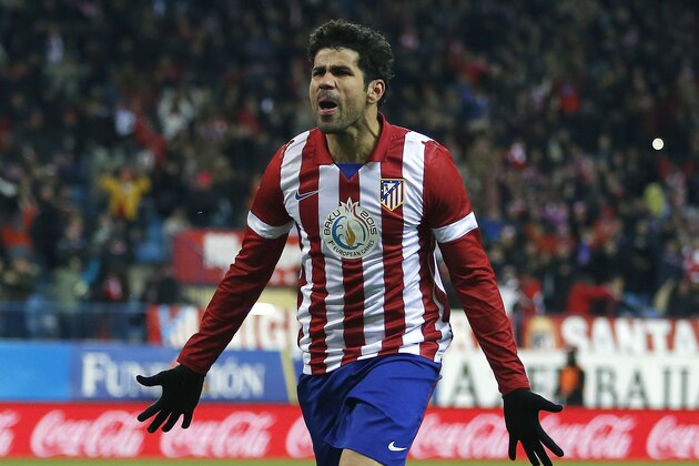 Atletico's Diego Costa celebrates his goal during a Spanish La Liga soccer match between Atletico de Madrid and Valencia at the Vicente Calderon stadium in Madrid, Spain, Sunday, Dec. 15, 2013. (AP Photo/Andres Kudacki)