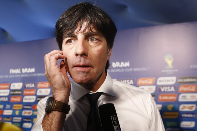 Germany head coach Joachim Loew answers journalists' questions after the draw ceremony for the 2014 soccer World Cup in Costa do Sauipe near Salvador, Brazil, Friday, Dec. 6, 2013. (AP Photo/Victor R. Caivano)