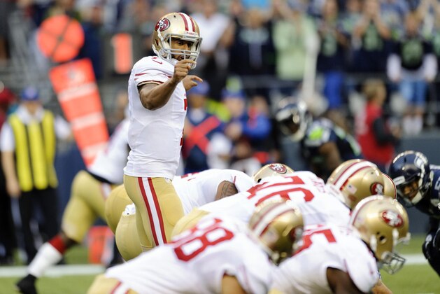 Sep 15, 2013; Seattle, WA, USA; San Francisco 49ers quarterback Colin Kaepernick (7) calls out plays during the 1st half against the Seattle Seahawks at CenturyLink Field. Mandatory Credit: Steven Bisig-USA TODAY Sports Sep 15, 2013; Seattle, WA, USA; San Francisco 49ers quarterback Colin Kaepernick (7) calls out plays during the 1st half against the Seattle Seahawks at CenturyLink Field. Mandatory Credit: Steven Bisig-USA TODAY Sports