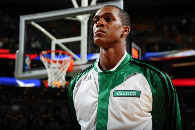 BOSTON, MA - JANUARY 15: Rajon Rondo #9 of the Boston Celtics during the national anthem before the game against the Toronto Raptors on January 15, 2014 at the TD Garden in Boston, Massachusetts.  NOTE TO USER: User expressly acknowledges and agrees that, by downloading and or using this photograph, User is consenting to the terms and conditions of the Getty Images License Agreement. Mandatory Copyright Notice: Copyright 2014 NBAE  (Photo by Brian Babineau/NBAE via Getty Images)