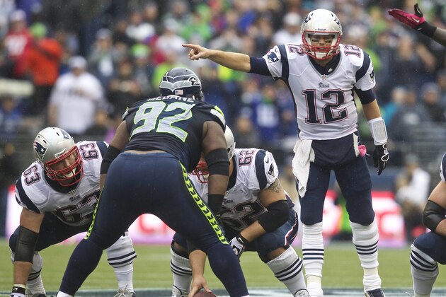 SEATTLE, WA - OCTOBER 14: Tom Brady #12 of the New England Patriots calls a play at the line of scrimmage during a game against the Seattle Seahawks at CenturyLink Field on October 14, 2012 in Seattle, Washington. The Seahawks beat the Patriots 24-23.  (Photo by Stephen Brashear/Getty Images)