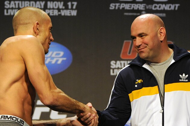 Nov 16, 2012; Montreal, QC, Canada;  Georges St-Pierre shakes the hand of Dana White during the weigh-in for UFC 154 at New City Gas.  Mandatory Credit: Eric Bolte-USA TODAY Sports