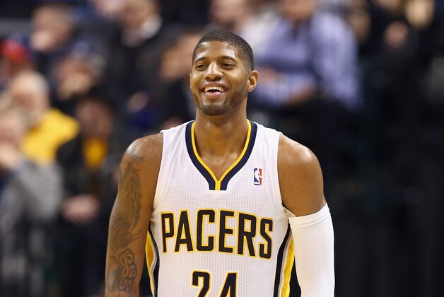 INDIANAPOLIS, IN - JANUARY 14:  Paul George #24 of the Indiana Pacers smiles during the game against the Sacramento Kings at Bankers Life Fieldhouse on January 14, 2014 in Indianapolis, Indiana.  NOTE TO USER: User expressly acknowledges and agrees that, by downloading and or using this Photograph, user is consenting to the terms and condition of the Getty Images License Agreement.  (Photo by Andy Lyons/Getty Images)