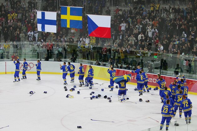 TURIN, ITALY - FEBRUARY 26: Team Sweden celebrates defeating Finland 3-2 to win the gold medal in the final of the men's ice hockey match between Finland and Sweden during Day 16 of the Turin 2006 Winter Olympic Games on February 26, 2006 at the Palasport Olimpico in Turin, Italy. (Photo by Robert Laberge/Getty Images) TURIN, ITALY - FEBRUARY 26: Team Sweden celebrates defeating Finland 3-2 to win the gold medal in the final of the men's ice hockey match between Finland and Sweden during Day 16 of the Turin 2006 Winter Olympic Games on February 26, 2006 at the Palasport Olimpico in Turin, Italy. (Photo by Robert Laberge/Getty Images)