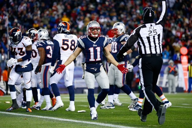 FOXBORO, MA - NOVEMBER 24: Wide receiver Julian Edelman #11 of the New England Patriots reacts to a call against the Denver Broncos during a game at Gillette Stadium on November 24, 2013 in Foxboro, Massachusetts.  (Photo by Jared Wickerham/Getty Images)