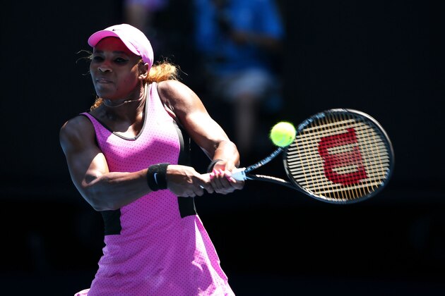 MELBOURNE, AUSTRALIA - JANUARY 17:  Serena Williams of the United States plays a backhand in her third round match against Daniela Hantuchova of Slovakia during day five of the 2014 Australian Open at Melbourne Park on January 17, 2014 in Melbourne, Australia.  (Photo by Clive Brunskill/Getty Images)