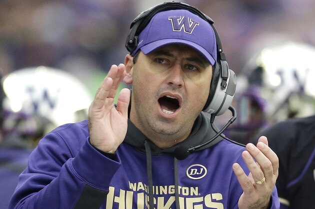 FILE - In this Nov. 29, 2013 file photo, Washington head coach Steve Sarkisian yells from the sidelines in the second half of an NCAA college football game against Washington State in Seattle. Sarkisian has accepted the Southern California coaching job, a person familiar with the decision told The Associated Press. The person spoke Monday Nov. 2, 2013 on condition of anonymity because no official announcement had been made by either school. (AP Photo/Elaine Thompson, File)