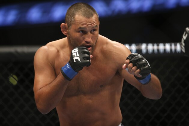 Lyoto Machida Dan Henderson during their UFC 157 light heavyweight mixed martial arts match in Anaheim, Calif., Saturday, Feb. 23, 2013. Machida won by split decision after the third round. (AP Photo/Jae C. Hong)
