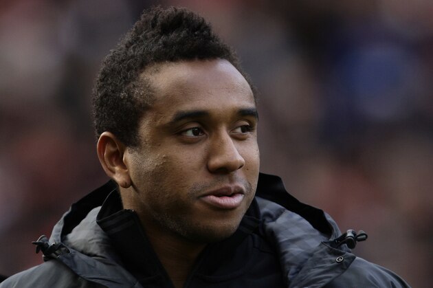Manchester United's Anderson takes to the touchline before his team's s English Premier League soccer match against Arsenal at Old Trafford Stadium, Manchester, England, Saturday, Nov. 3, 2012. (AP Photo/Jon Super)