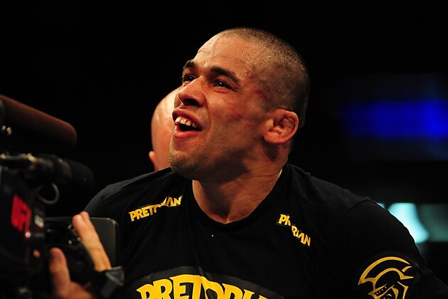 Jul 21, 2012; Calgary, AB, CANADA; Renan Barao celebrates defeating Urijah Faber (not pictured) in the interim bantamweight title bout of UFC 149 at the Scotiabank Saddledome. Mandatory Credit: Anne-Marie Sorvin-USA TODAY Sports