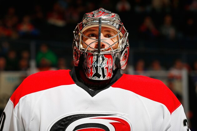 UNIONDALE, NY - OCTOBER 19:  Cam Ward #30 of the Carolina Hurricanes skates against the New York Islanders at Nassau Veterans Memorial Coliseum on October 19, 2013 in Uniondale, New York. The Hurricanes defeated the Islanders 4-3.  (Photo by Mike Stobe/NHLI via Getty Images)