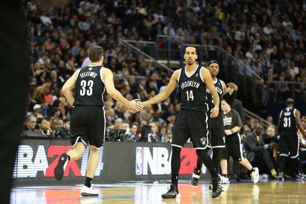 LONDON, ENGLAND - JANUARY 16: Mirza Teletovic #33 and Shaun Livingston #14 of the Brooklyn Nets celebrates against the Atlanta Hawks as part of  the 2014 Global Games on January 16, 2014 at The O2 Arena in London, England. NOTE TO USER: User expressly acknowledges and agrees that, by downloading and/or using this Photograph, user is consenting to the terms and conditions of the Getty Images License Agreement. Mandatory Copyright Notice: Copyright 2014 NBAE (Photo by Nathaniel S. Butler/NBAE via Getty Images)