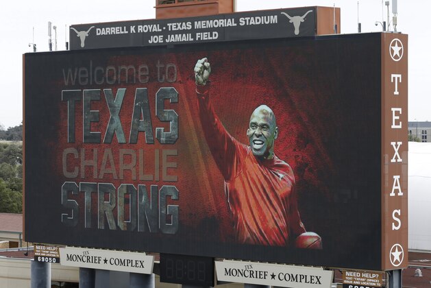 A welcome sign is displayed on the scoreboard at Darrell K Royal–Texas Memorial Stadium for new Texas NCAA college football coach Charlie Strong, Monday, Jan. 6, 2014, in Austin, Texas. Strong replaces Mack Brown, who coached Texas for 16 years and won the 2005 national championship. Strong spent the previous four years at Louisville. (AP Photo/Eric Gay) A welcome sign is displayed on the scoreboard at Darrell K Royal–Texas Memorial Stadium for new Texas NCAA college football coach Charlie Strong, Monday, Jan. 6, 2014, in Austin, Texas. Strong replaces Mack Brown, who coached Texas for 16 years and won the 2005 national championship. Strong spent the previous four years at Louisville. (AP Photo/Eric Gay)