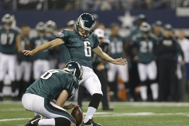 Philadelphia Eagles kicker Alex Henery (6) kicks a field goal with teammate Donnie Jones (8) during the first half of an NFL football game against the Dallas Cowboys Sunday, Dec. 29, 2013, in Arlington, Texas.(AP Photo/Tim Sharp)