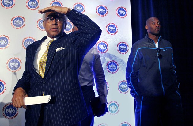 Executive Director of the National Basketball Player's Association Billy Hunter, left, and Los Angeles Laker's Kobe Bryant arrive for a news conference following a labor talks meeting of NBA players and owners on Tuesday, Oct. 4, 2011, in New York. (AP Photo/Bebeto Matthews)