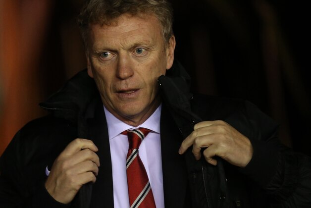 Manchester United's manager David Moyes looks on ahead of  their English League Cup semifinal first leg soccer match against Sunderland at the Stadium of Light, Sunderland, England, Tuesday, Jan. 7, 2014. (AP Photo/Scott Heppell)
