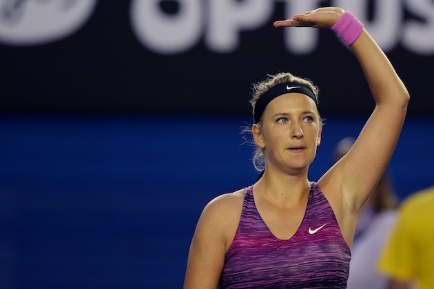 Victoria Azarenka of Belarus waves to the crowd after defeating Yvonne Meusburger of Austria in their third match at the Australian Open tennis championship in Melbourne, Australia, Saturday, Jan. 18, 2014.(AP Photo/Aaron Favila)(AP Photo/Aaron Favila)