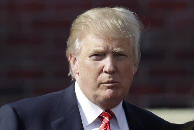 FILE - In this Sept. 27, 2012 file photo, Donald Trump arrives for the opening ceremony at the Ryder Cup PGA golf tournament at the Medinah Country Club in Medinah, Ill.  Trump has deleted some of the Twitter tirade he posted following President Barack Obama's re-election and added new critiques of NBC's Brian Williams. Trump began tweeting before the election was called that it was “a total sham and a travesty.” After news outlets projected that Obama won the election, Trump tweeted, “Well, back to the drawing board!” He posted more than 10 angry tweets, declaring “our nation is a once great nation divided” and “the world is laughing at us.” He encouraged a “revolution in this country.”(AP Photo/David J. Phillip)