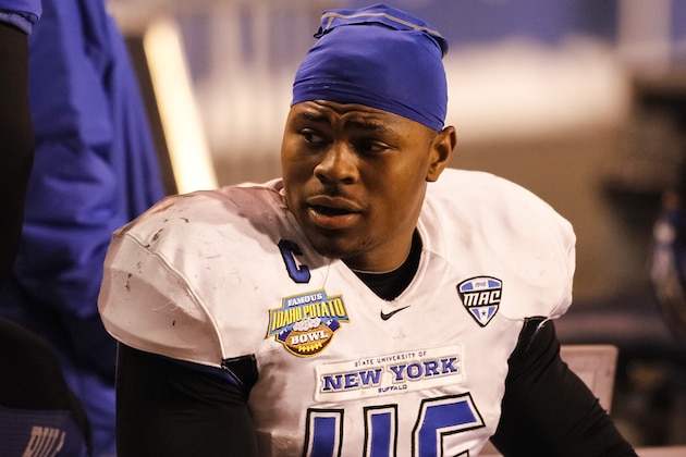 Buffalo linebacker Khalil Mack (46) talks to a teammate during the second half of the Famous Idaho Potato Bowl NCAA college football game against San Diego State in Boise, Idaho, on Saturday, Dec. 21, 2013. San Diego State defeated Buffalo 49-24. (AP Photo/Otto Kitsinger)