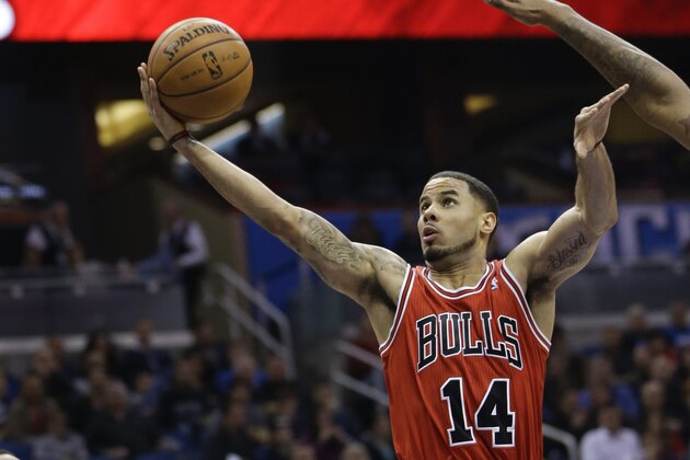 Chicago Bulls' D.J. Augustin (14) goes up for a shot against the Orlando Magic during the first half of an NBA basketball game in Orlando, Fla., Wednesday, Jan. 15, 2014.(AP Photo/John Raoux)