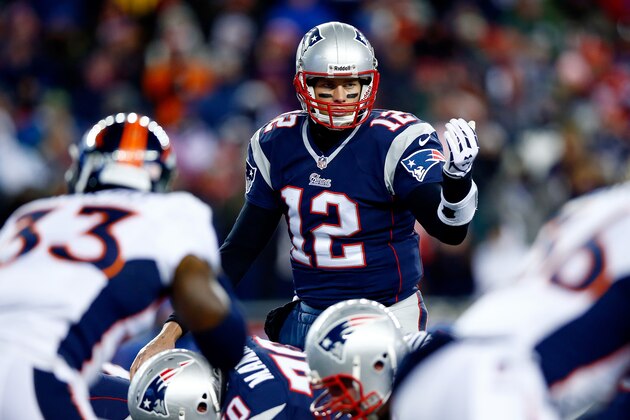 FOXBORO, MA - NOVEMBER 24:  Quarterback Tom Brady #12 of the New England Patriots calls a play against the Denver Broncos during a game at Gillette Stadium on November 24, 2013 in Foxboro, Massachusetts.  (Photo by Jared Wickerham/Getty Images)