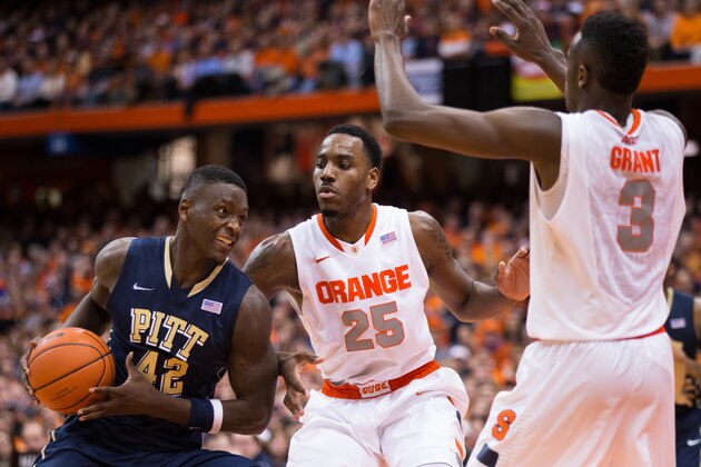SYRACUSE, NY - JANUARY 18:  Talib Zanna #42 of the Pittsburgh Panthers drives against Rakeem Christmas #25 and Jerami Grant #3 of the Syracuse Orange in the second half on January 18, 2014 at The Carrier Dome in Syracuse, New York.  Syracuse defeats Pittsburgh 59-54.  (Photo by Brett Carlsen/Getty Images)