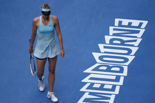 Maria Sharapova of Russia walks on the court as she plays Alize Cornet of France during their third round match at the Australian Open tennis championship in Melbourne, Australia, Saturday, Jan. 18, 2014. (AP Photo/Eugene Hoshiko) Maria Sharapova of Russia walks on the court as she plays Alize Cornet of France during their third round match at the Australian Open tennis championship in Melbourne, Australia, Saturday, Jan. 18, 2014. (AP Photo/Eugene Hoshiko)