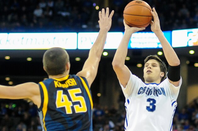 OMAHA, NE - DECEMBER 22: Doug McDermott #3 of the Creighton Bluejays shoots over David Kravish #45 of the California Golden Bears during their game at the CenturyLink Center on December 22, 2013 in Omaha, Nebraska. (Photo by Eric Francis/Getty Images)