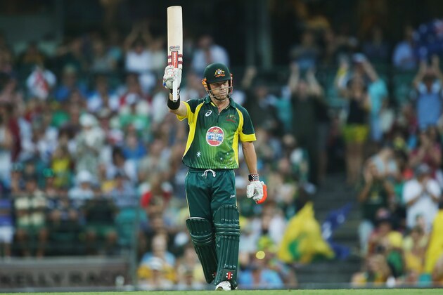 SYDNEY, AUSTRALIA - JANUARY 19:  David Warner raises his bat to acknowledge his half-century during game three of the One Day International Series between Australia and England at Sydney Cricket Ground on January 19, 2014 in Sydney, Australia.  (Photo by Don Arnold/Getty Images)