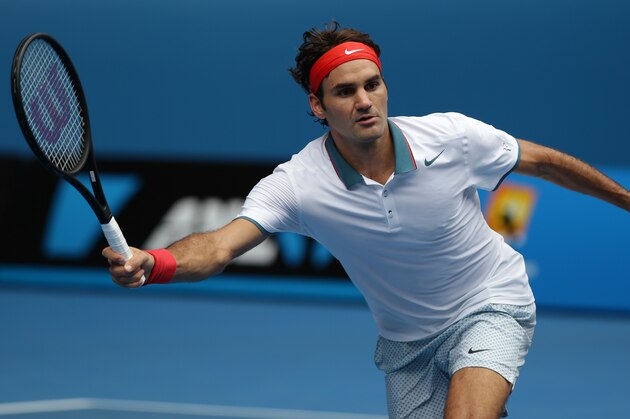Roger Federer of Switzerland makes a forehand return to Teymuraz Gabashvili of Russia during their third round match at the Australian Open tennis championship in Melbourne, Australia, Saturday, Jan. 18, 2014.(AP Photo/Aaron Favila) Roger Federer of Switzerland makes a forehand return to Teymuraz Gabashvili of Russia during their third round match at the Australian Open tennis championship in Melbourne, Australia, Saturday, Jan. 18, 2014.(AP Photo/Aaron Favila)