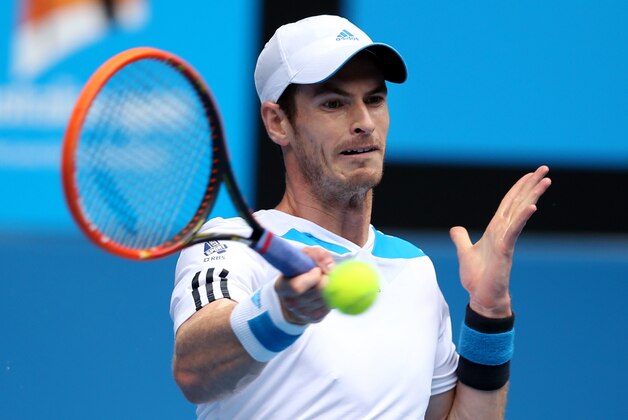 Andy Murray of Britain makes a forehand return to Feliciano Lopez of Spain during their third round match at the Australian Open tennis championship in Melbourne, Australia, Saturday, Jan. 18, 2014.(AP Photo/Rick Rycroft)