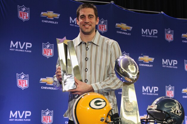 DALLAS, TX - FEBRUARY 07:  Green Bay Packers quarterback Aaron Rodgers poses with the MVP trophy after speaking to the media during a press conference at Super Bowl XLV Media Center on February 7, 2011 in Dallas, Texas.  (Photo by Streeter Lecka/Getty Images)