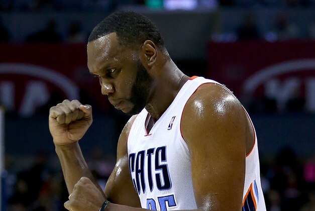 CHARLOTTE, NC - JANUARY 18:  Al Jefferson #25 of the Charlotte Bobcats reacts after a play during their game against the Miami Heat at Time Warner Cable Arena on January 18, 2014 in Charlotte, North Carolina.  NOTE TO USER: User expressly acknowledges and agrees that, by downloading and or using this photograph, User is consenting to the terms and conditions of the Getty Images License Agreement.  (Photo by Streeter Lecka/Getty Images)