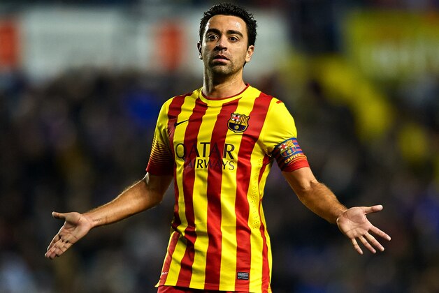 VALENCIA, SPAIN - JANUARY 19:  Xavi Hernandez of Barcelona reacts during the la Liga match between Levante UD and FC Barcelona at Ciutat de Valencia on January 19, 2014 in Valencia, Spain.  (Photo by Manuel Queimadelos Alonso/Getty Images)