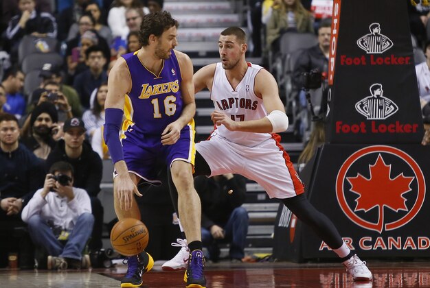 Jan 19, 2014; Toronto, Ontario, CAN; Toronto Raptors center Jonas Valanciunas (17) defends against Los Angeles Lakers center-forward Pau Gasol (16) during the first half at the Air Canada Centre. Mandatory Credit: John E. Sokolowski-USA TODAY Sports