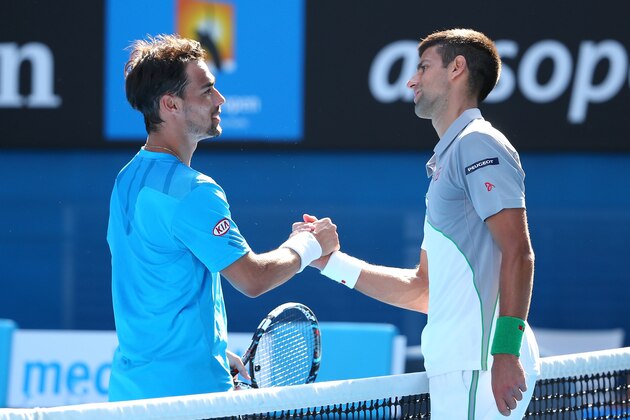 MELBOURNE, AUSTRALIA - JANUARY 19:  Novak Djokovic of Serbia and Fabio Fognini of Italy shake hands at the net on after their fourth round match during day seven of the 2014 Australian Open at Melbourne Park on January 19, 2014 in Melbourne, Australia.  (Photo by Quinn Rooney/Getty Images)