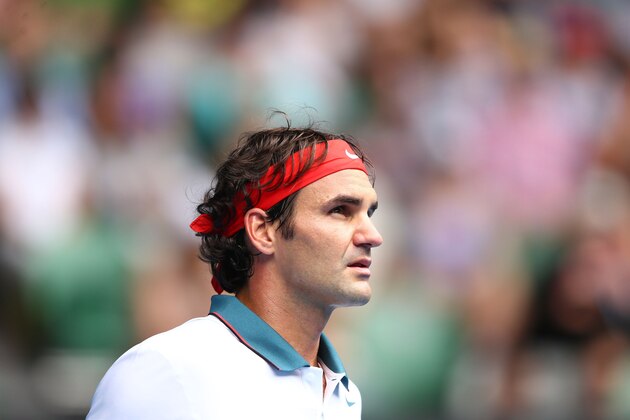 MELBOURNE, AUSTRALIA - JANUARY 18: Roger Federer of Switzerland looks on in his third round match against Teymuraz Gabashvili of Russia during day six of the 2014 Australian Open at Melbourne Park on January 18, 2014 in Melbourne, Australia. (Photo by Cameron Spencer/Getty Images) MELBOURNE, AUSTRALIA - JANUARY 18: Roger Federer of Switzerland looks on in his third round match against Teymuraz Gabashvili of Russia during day six of the 2014 Australian Open at Melbourne Park on January 18, 2014 in Melbourne, Australia. (Photo by Cameron Spencer/Getty Images)