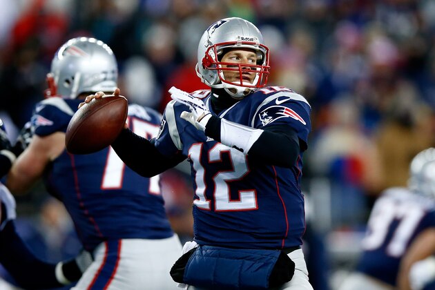 FOXBORO, MA - NOVEMBER 24:  Quarterback Tom Brady #12 of the New England Patriots looks to pass against the Denver Broncos during a game at Gillette Stadium on November 24, 2013 in Foxboro, Massachusetts.  (Photo by Jared Wickerham/Getty Images)