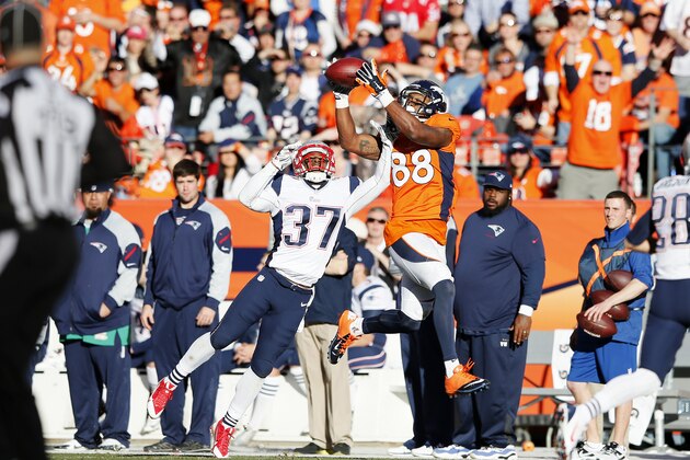 DENVER, CO - JANUARY 19:   Demaryius Thomas #88 of the Denver Broncos completes a fourth quarter reception against  Alfonzo Dennard #37 of the New England Patriots during the AFC Championship game at Sports Authority Field at Mile High on January 19, 2014 in Denver, Colorado.  (Photo by Kevin C. Cox/Getty Images)
