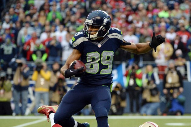 Jan 19, 2014; Seattle, WA, USA; Seattle Seahawks wide receiver Doug Baldwin (89) gets past San Francisco 49ers defensive back C.J. Spillman (27)  during the first half of the 2013 NFC Championship football game at CenturyLink Field. Mandatory Credit: Kyle Terada-USA TODAY Sports