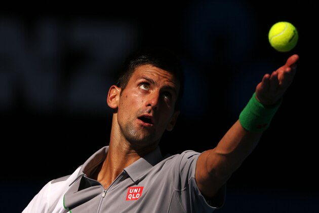 MELBOURNE, AUSTRALIA - JANUARY 19:  Novak Djokovic of Serbia serves in his fourth round match against Fabio Fognini of Italy during day seven of the 2014 Australian Open at Melbourne Park on January 19, 2014 in Melbourne, Australia.  (Photo by Michael Dodge/Getty Images)