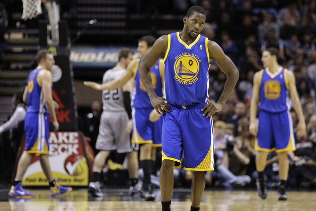 Golden State Warriors' Toney Douglas (0) reacts after the Warriors turned the ball over against the San Antonio Spurs during the second half of an NBA basketball game, Friday, Nov. 8, 2013, in San Antonio. San Antonio won 76-74. (AP Photo/Eric Gay)