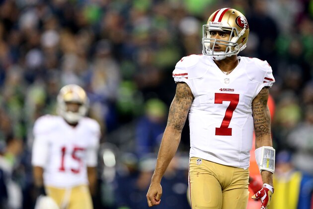 SEATTLE, WA - JANUARY 19:  Quarterback Colin Kaepernick #7 of the San Francisco 49ers reacts in the fourth quarter while taking on the Seattle Seahawks during the 2014 NFC Championship at CenturyLink Field on January 19, 2014 in Seattle, Washington.  (Photo by Christian Petersen/Getty Images)