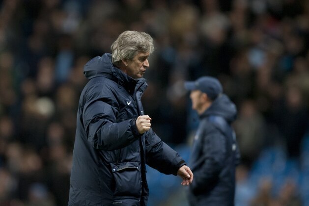 Manchester City's manager Manuel Pellegrini reacts after his team's 1-0 win over Crystal Palace in their English Premier League soccer match at the Etihad Stadium, Manchester, England, Saturday Dec. 28, 2013. (AP Photo/Jon Super)